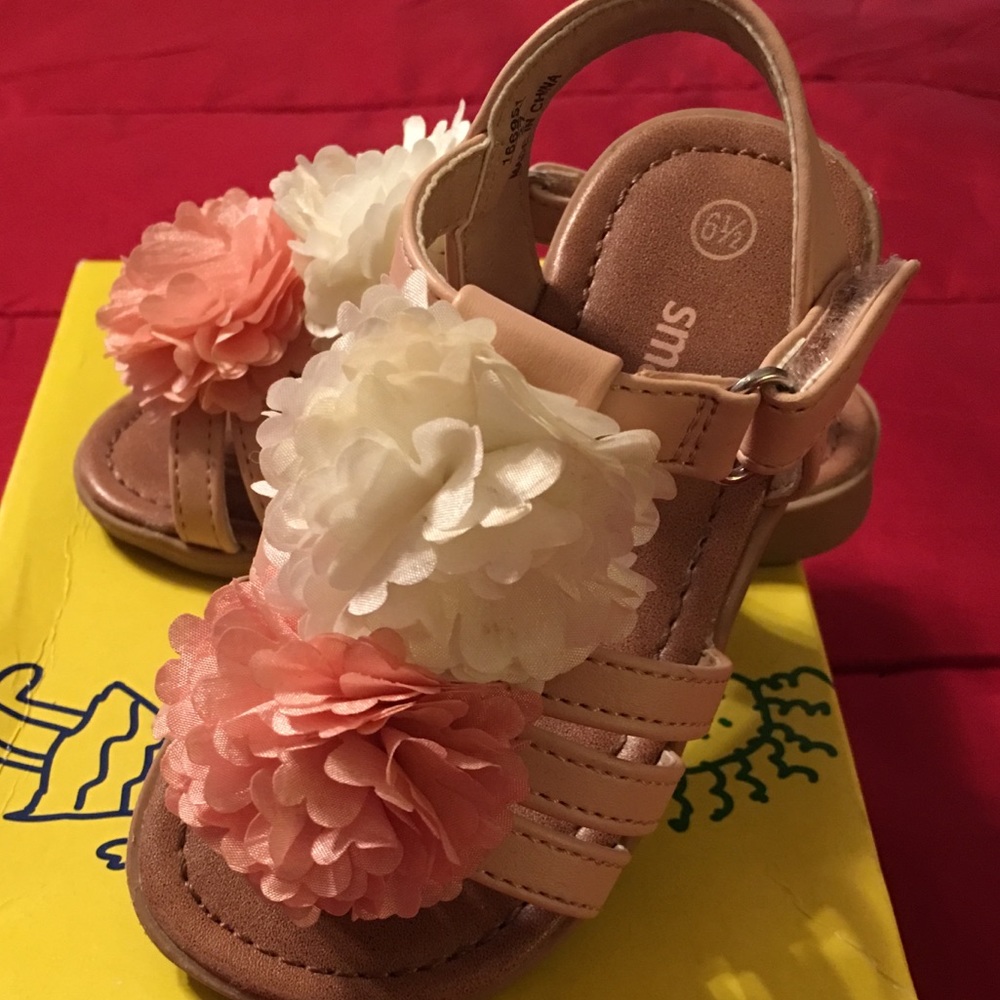 Adorable blush and white sandals with flowers